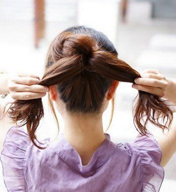 2011瘦脸的发型-散发浪漫气息的花苞头