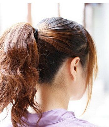 2011瘦脸的发型-散发浪漫气息的花苞头