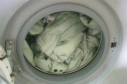羽绒服可以用洗衣机洗吗 揭羽绒服的清洗方法