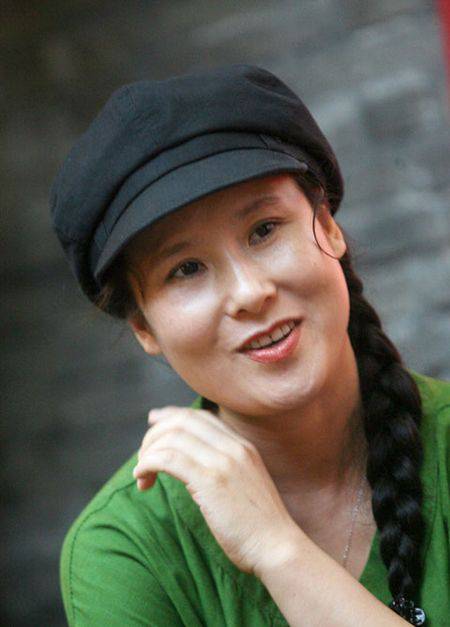 谢广坤的扮演者唐鉴军个人资料 唐鉴军老婆王小华照片