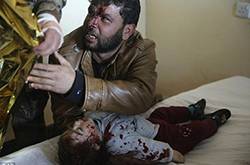 15月大女婴被is炸死 父亲抱着女儿的遗体痛哭